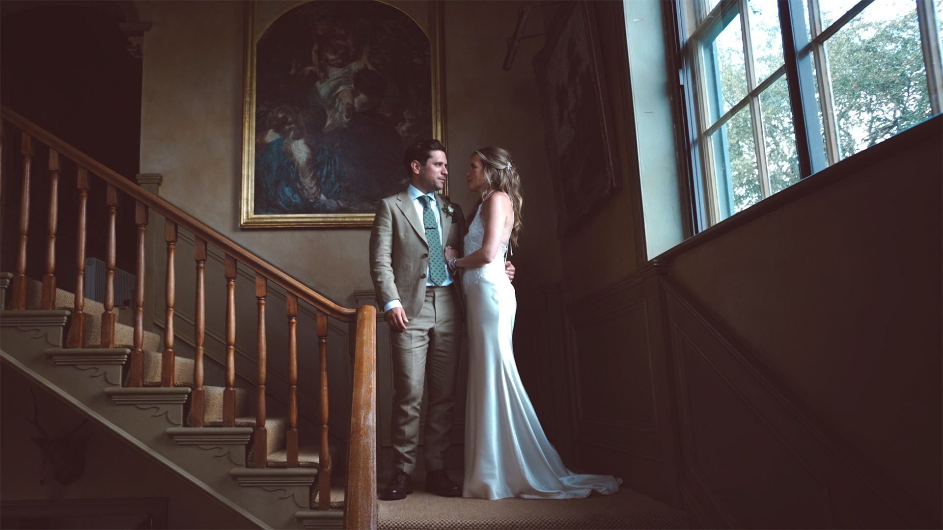 Pauntley Court Wedding Bride and groom on the stairs on the stairs